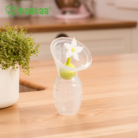 Photo de Haakaa® Set recueil-lait en silicone 100ml Generation 1 avec Bouchon Fleur